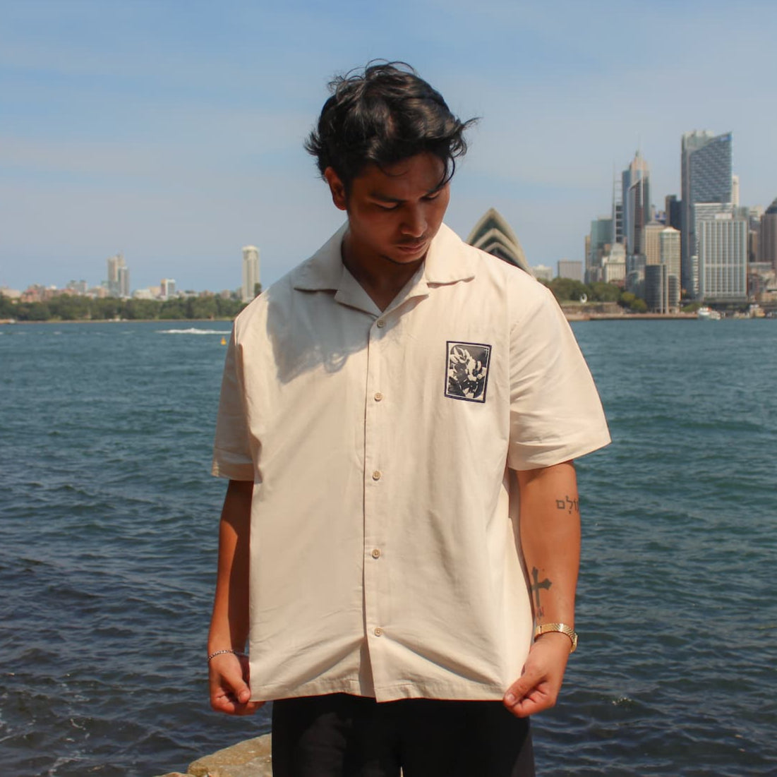 beige button up with embroidered patch christian apparel